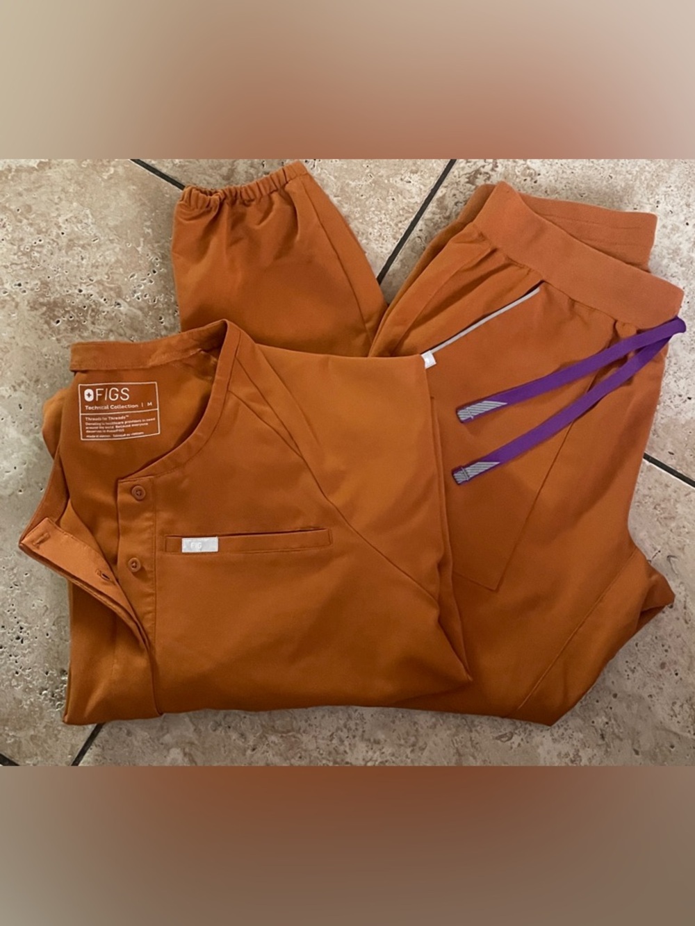 Figs Burnt Orange Scrub Top and Pants with Purple Drawstrings